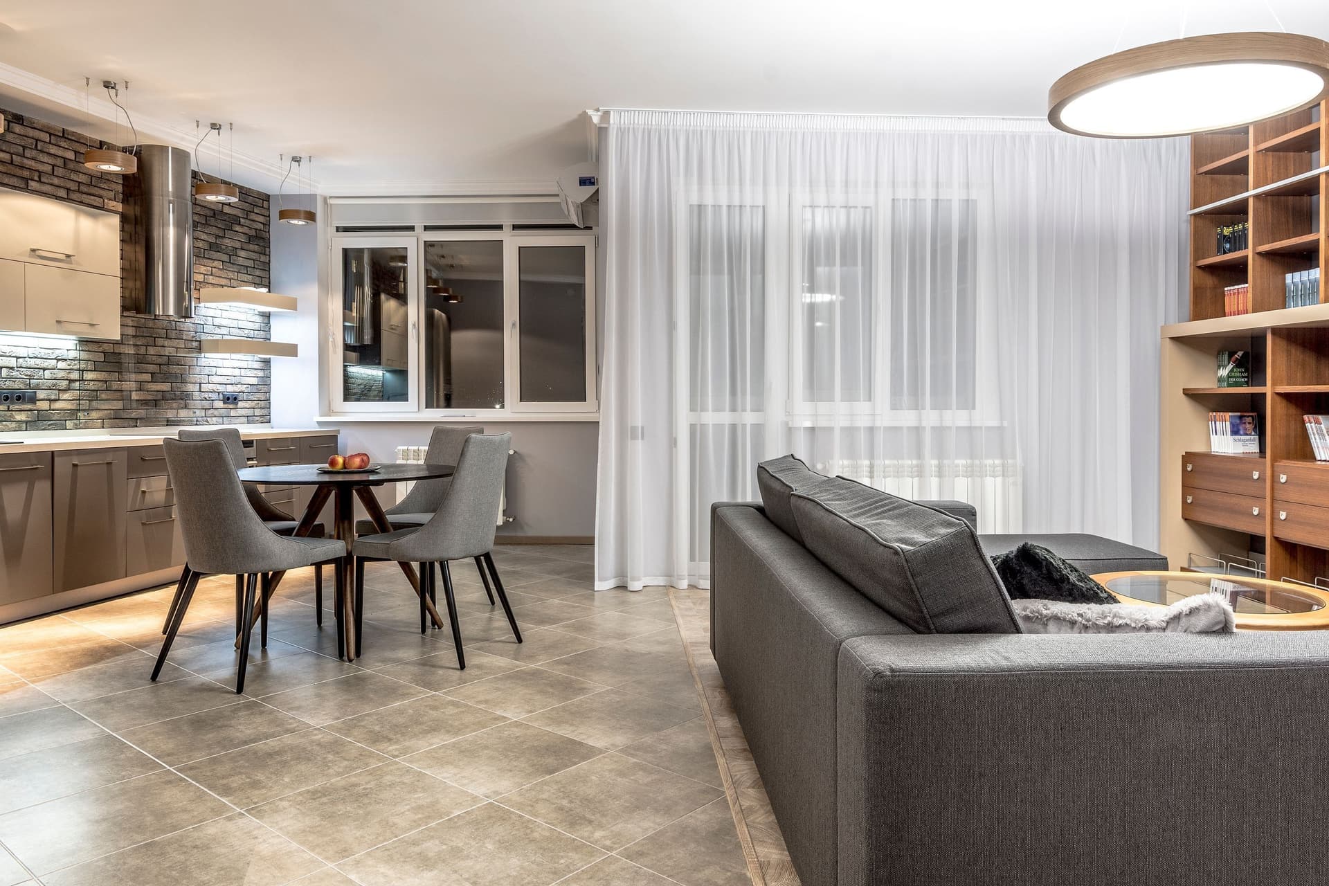 Spotless open-plan kitchen, dining and living area after a professional cleaning